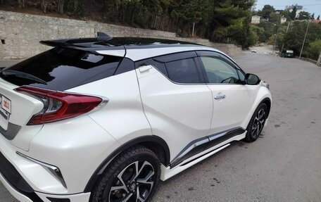 Toyota C-HR I рестайлинг, 2018 год, 2 400 000 рублей, 9 фотография