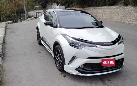 Toyota C-HR I рестайлинг, 2018 год, 2 400 000 рублей, 5 фотография