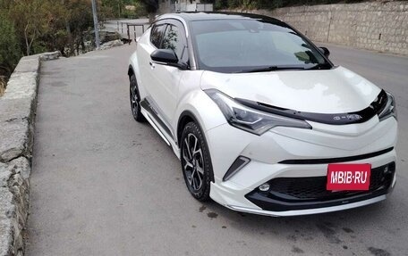 Toyota C-HR I рестайлинг, 2018 год, 2 400 000 рублей, 6 фотография