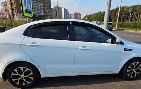 KIA Rio III рестайлинг, 2013 год, 890 000 рублей, 3 фотография