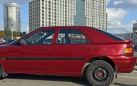 Mazda 323, 1990 год, 175 000 рублей, 9 фотография