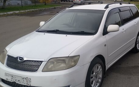 Toyota Corolla, 2004 год, 700 000 рублей, 9 фотография