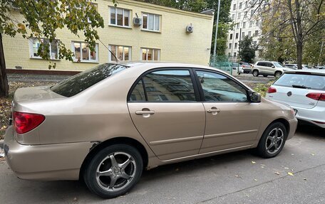 Toyota Corolla, 2004 год, 550 000 рублей, 3 фотография