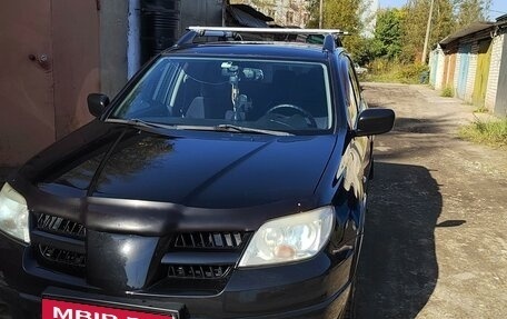 Mitsubishi Outlander III рестайлинг 3, 2004 год, 660 000 рублей, 10 фотография