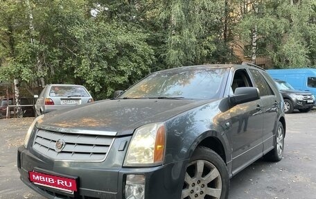 Cadillac SRX II рестайлинг, 2007 год, 550 000 рублей, 8 фотография