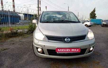 Nissan Tiida, 2010 год, 699 000 рублей, 9 фотография