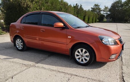 KIA Rio II, 2011 год, 750 000 рублей, 3 фотография