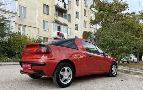 Opel Tigra, 1995 год, 345 000 рублей, 1 фотография