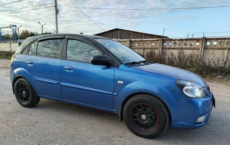 KIA Rio II, 2010 год, 12 фотография