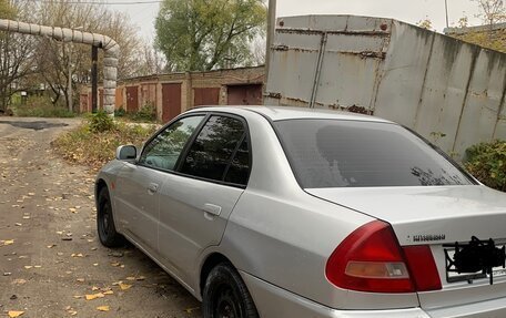 Mitsubishi Lancer VII, 1997 год, 187 000 рублей, 4 фотография