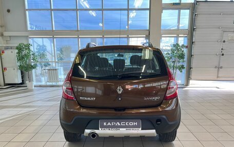 Renault Sandero I, 2013 год, 900 000 рублей, 4 фотография