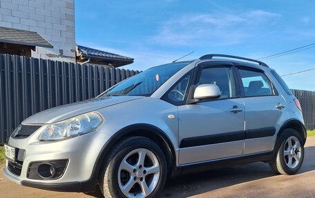 Suzuki SX4 II рестайлинг, 2010 год, 750 000 рублей, 14 фотография