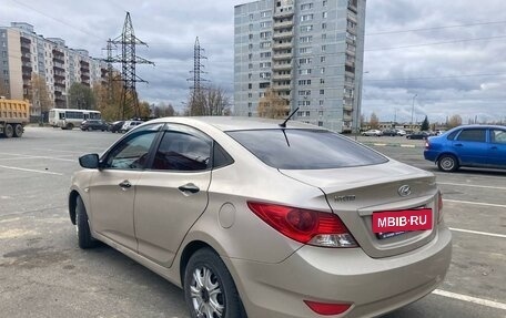 Hyundai Solaris II рестайлинг, 2011 год, 650 000 рублей, 3 фотография