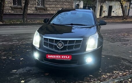 Cadillac SRX II рестайлинг, 2011 год, 1 600 000 рублей, 4 фотография