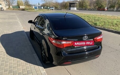 KIA Rio III рестайлинг, 2013 год, 900 000 рублей, 8 фотография