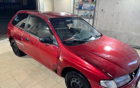 Mazda 323, 1997 год, 110 000 рублей, 24 фотография