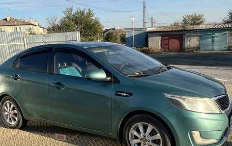 KIA Rio III рестайлинг, 2012 год, 695 000 рублей, 3 фотография