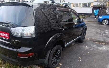 Mitsubishi Outlander III рестайлинг 3, 2007 год, 950 000 рублей, 4 фотография