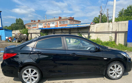 Hyundai Solaris II рестайлинг, 2011 год, 700 000 рублей, 2 фотография