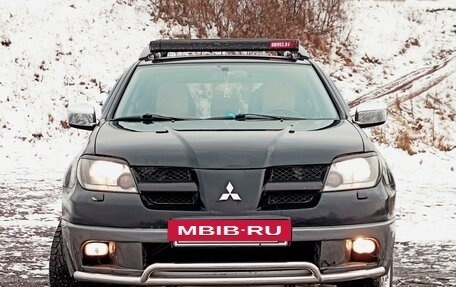 Mitsubishi Outlander III рестайлинг 3, 2004 год, 889 000 рублей, 2 фотография