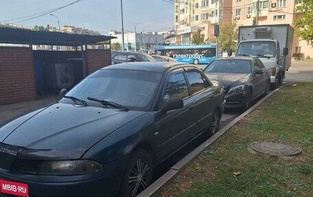 Mitsubishi Carisma I, 1999 год, 260 000 рублей, 1 фотография