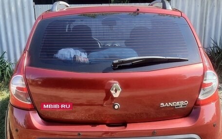 Renault Sandero I, 2013 год, 900 000 рублей, 2 фотография