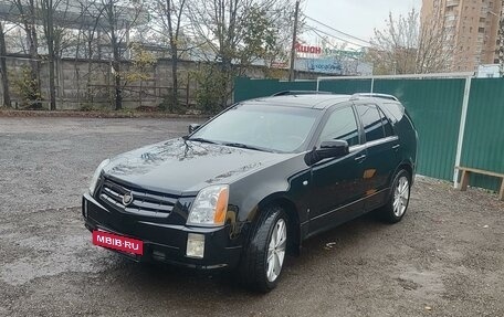 Cadillac SRX II рестайлинг, 2009 год, 895 000 рублей, 3 фотография