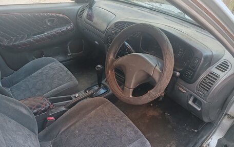 Mitsubishi Mirage VI рестайлинг, 1998 год, 85 000 рублей, 13 фотография