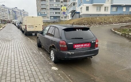 Mazda 323, 1999 год, 250 000 рублей, 4 фотография