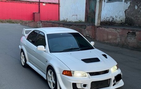 Mitsubishi Lancer Evolution IV, 1996 год, 1 200 000 рублей, 2 фотография