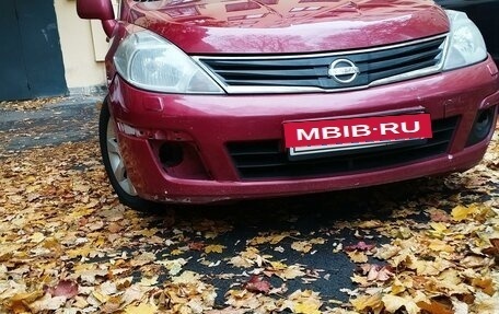 Nissan Tiida, 2010 год, 580 000 рублей, 9 фотография