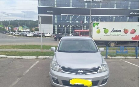 Nissan Tiida, 2010 год, 850 000 рублей, 1 фотография