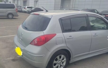 Nissan Tiida, 2010 год, 850 000 рублей, 6 фотография