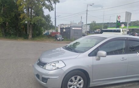 Nissan Tiida, 2010 год, 850 000 рублей, 2 фотография