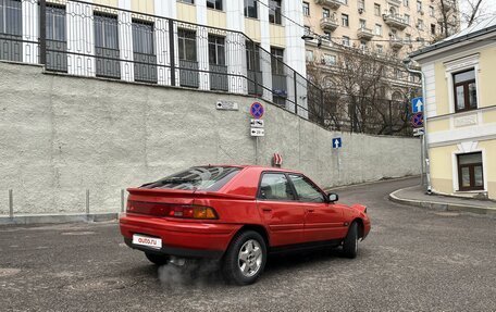 Mazda 323, 1990 год, 389 000 рублей, 3 фотография