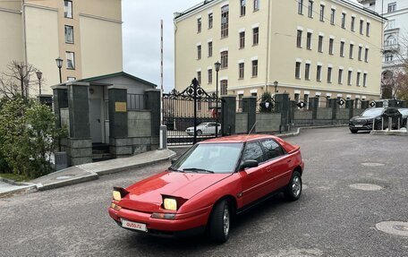 Mazda 323, 1990 год, 389 000 рублей, 5 фотография