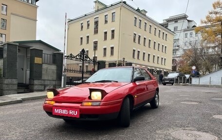 Mazda 323, 1990 год, 389 000 рублей, 2 фотография