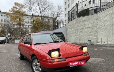 Mazda 323, 1990 год, 389 000 рублей, 6 фотография