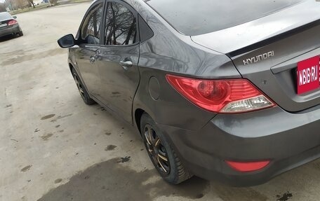 Hyundai Solaris II рестайлинг, 2011 год, 690 000 рублей, 13 фотография