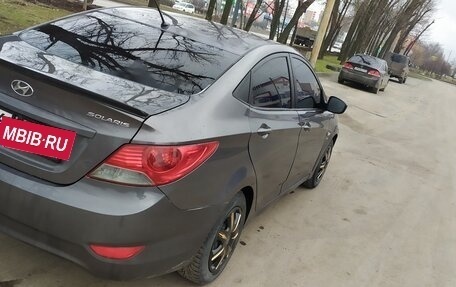 Hyundai Solaris II рестайлинг, 2011 год, 690 000 рублей, 14 фотография