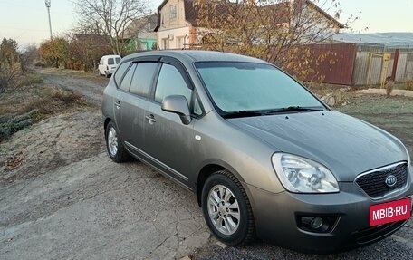 KIA Carens III (RP), 2011 год, 995 000 рублей, 4 фотография