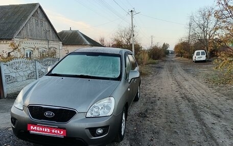 KIA Carens III (RP), 2011 год, 995 000 рублей, 3 фотография