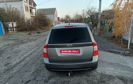 KIA Carens III (RP), 2011 год, 995 000 рублей, 11 фотография