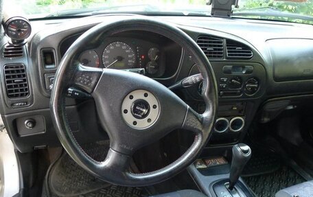 Mitsubishi Mirage VI рестайлинг, 2001 год, 680 000 рублей, 18 фотография