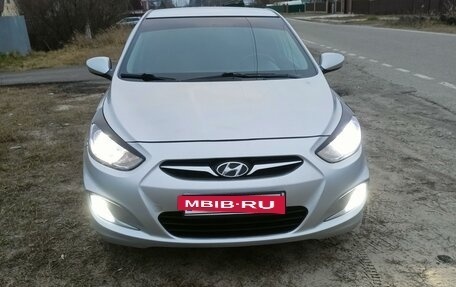 Hyundai Solaris II рестайлинг, 2011 год, 715 000 рублей, 11 фотография