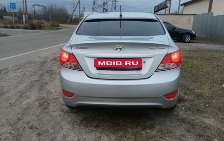 Hyundai Solaris II рестайлинг, 2011 год, 715 000 рублей, 13 фотография