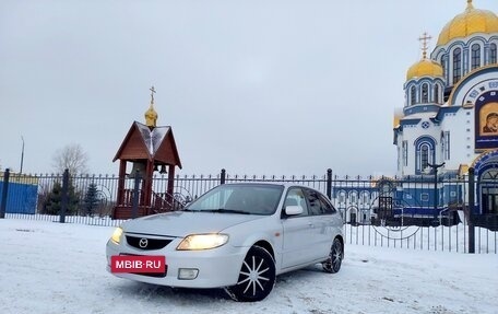 Mazda 323, 2001 год, 399 000 рублей, 14 фотография