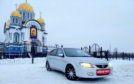 Mazda 323, 2001 год, 399 000 рублей, 15 фотография