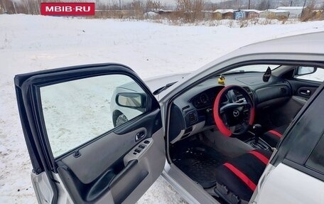 Mazda 323, 2001 год, 399 000 рублей, 24 фотография