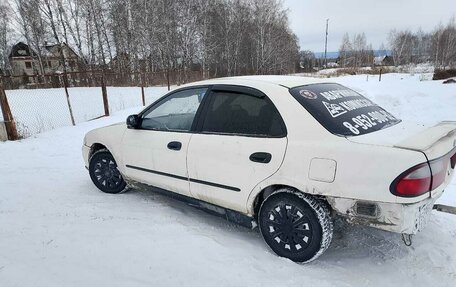 Mazda Familia, 1998 год, 170 000 рублей, 6 фотография